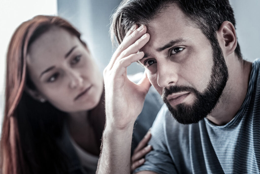 woman supporting a troubled man with marijuana abuse issues