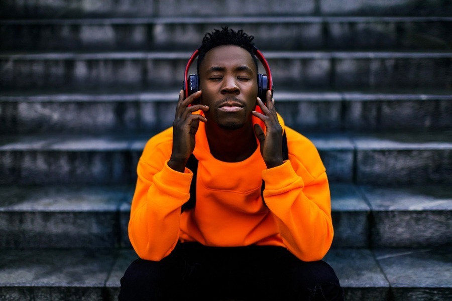 man listening to music for holistic therapy