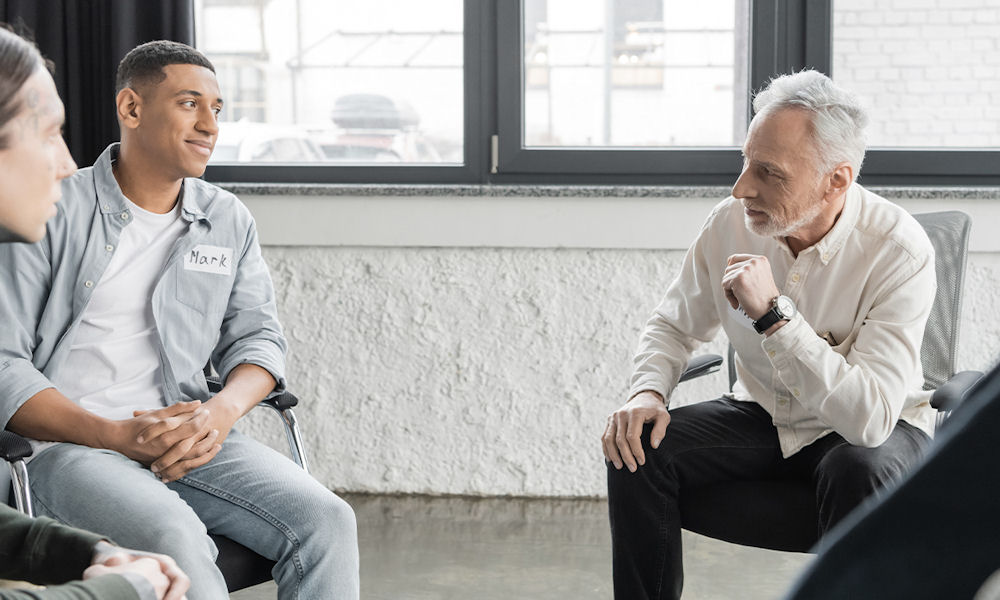 men in group therapy