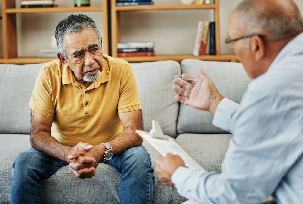 older man in addiction therapy