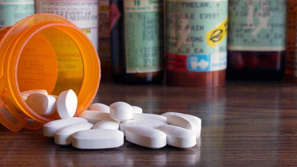 prescriptions pills spilled onto a counter
